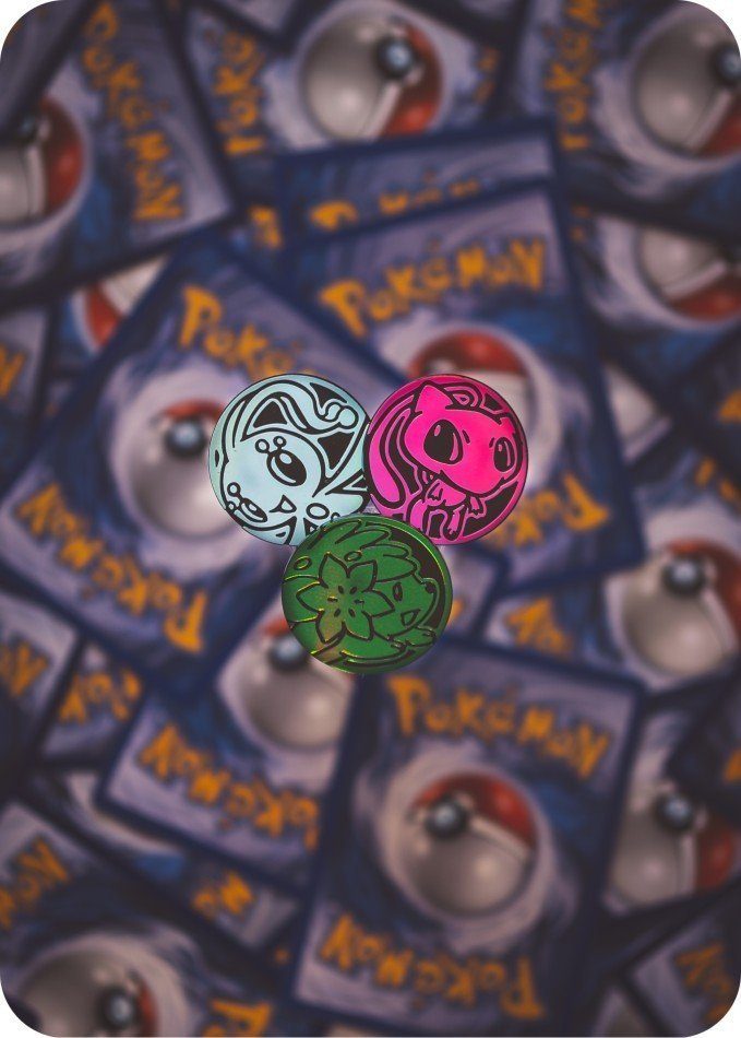 Billede af 3 forskellige Pokémon mønter
